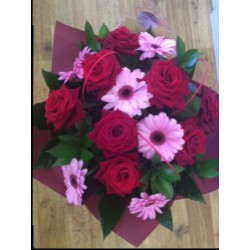 Red roses and Gerbera Aqua packed Bouquet