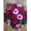 Red roses and Gerbera Aqua packed Bouquet